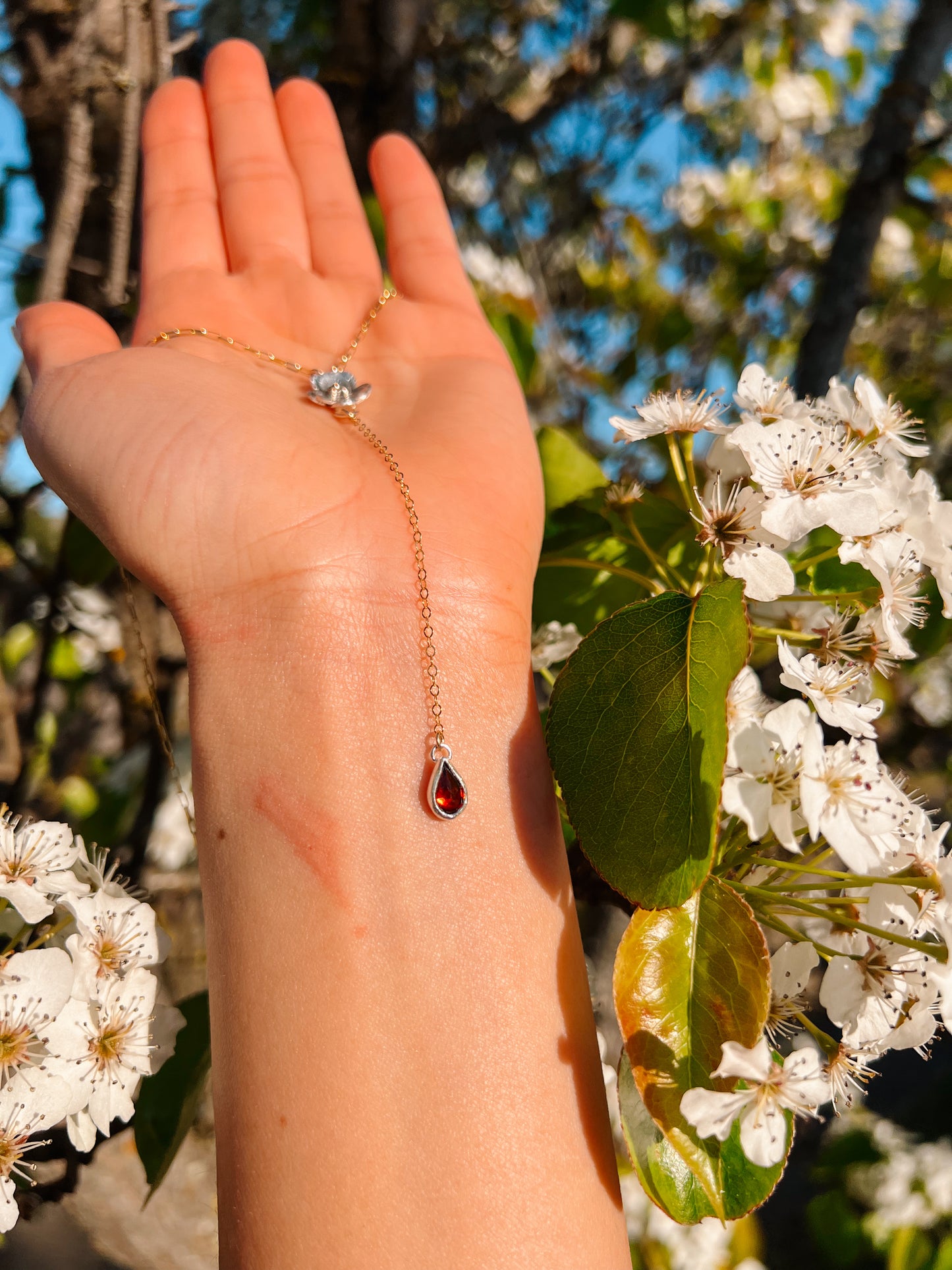 Blossom and Garnet Fixed Lariat